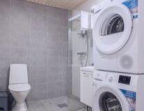 bathroom, sink, indoor, plumbing fixture, wall, home appliance, shower, washing machine, bathroom accessory, tap, bathtub, appliance